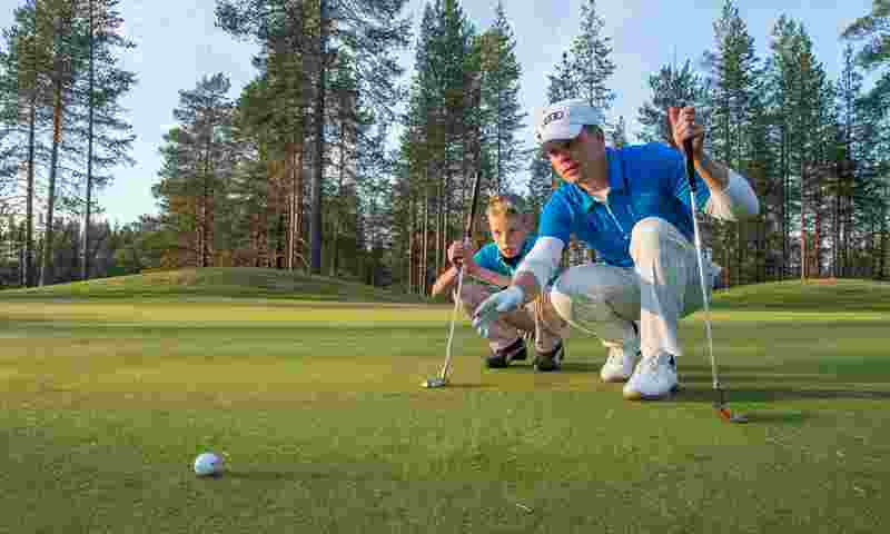 kuusamo-golf-man-and-boy-hor.jpg